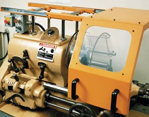 Workpiece guard that protects the operator from coming in contact with rotating parts.